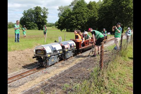 The University of Sheffield locomotive climbs past the noise monitoring point during the traction challenge.